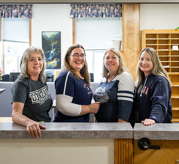 Blaine Garvin sits next to the Hemmingson fireplace.